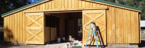 An open barn stable under construction to add more safety features.