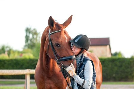 Girl bonding with horse